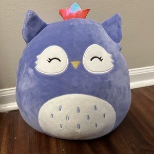 Purple owl squishmellow with  crown